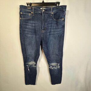 Woman’s LEVI Strauss denim jeans. Button fly, raw hem. Wedgie skinny size 32.